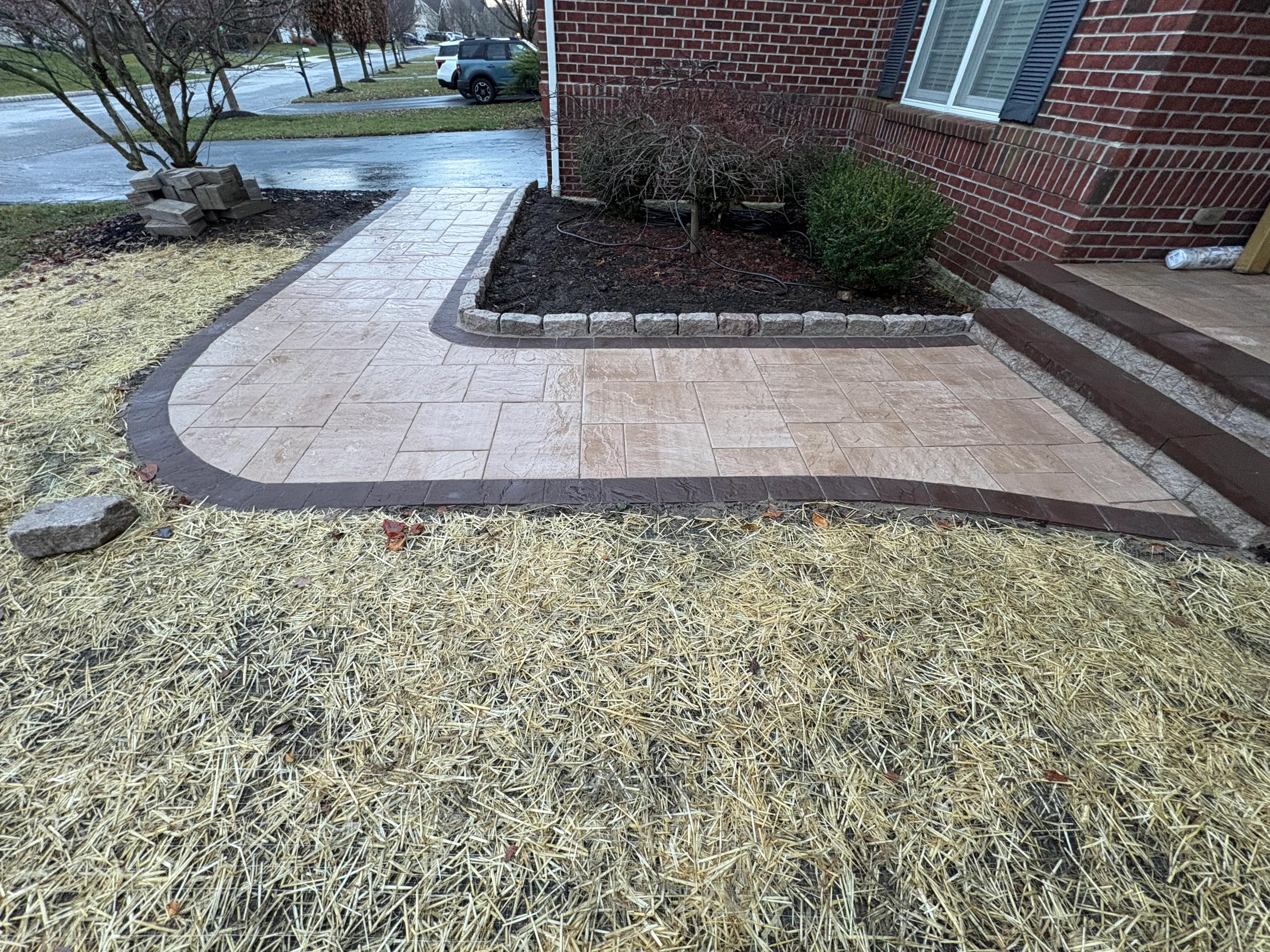 Stamped Concrete Patio with Landscape Edging